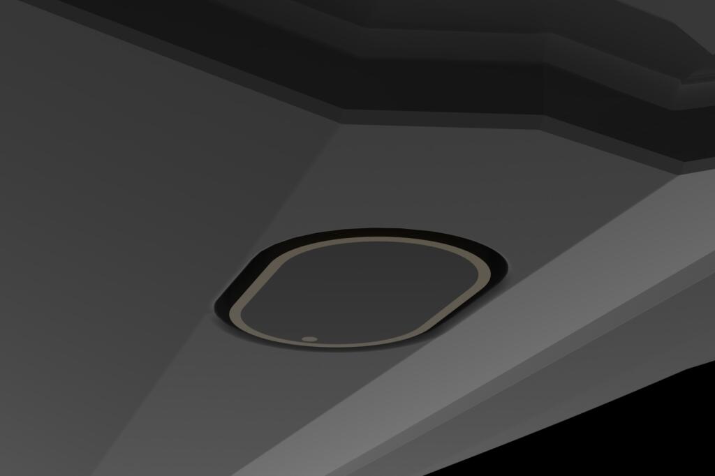Recessed oval light fixture mounted in hard-top ceiling with black trim and polished trim ring